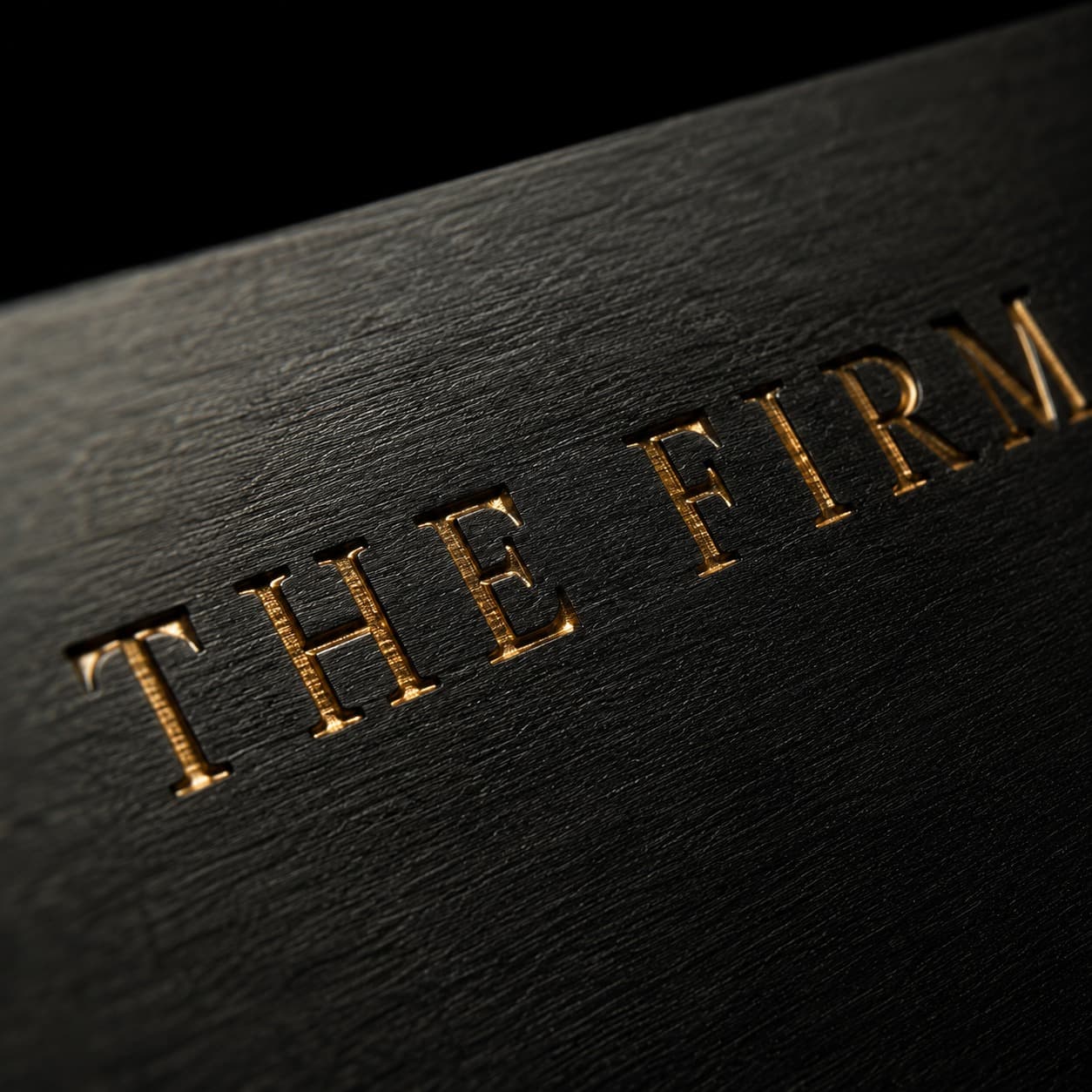 The Firm, engraved and gilded